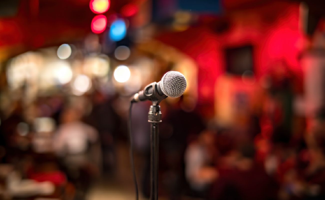 Comedian performing live